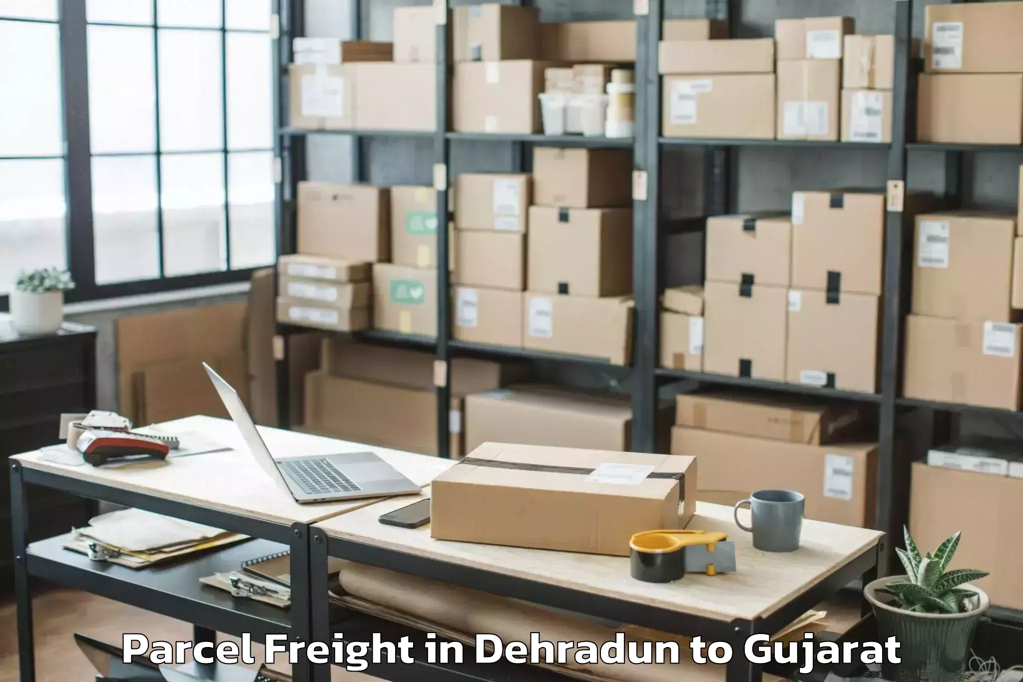 Easy Dehradun to Modasa Parcel Freight Booking